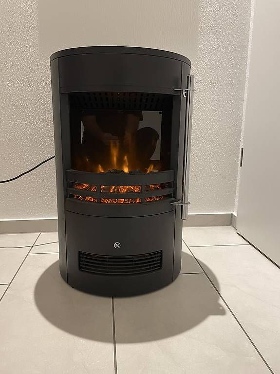 Heizgeräte: Elektrisches Cheminee mit Warmluft-Gebläse – Gebraucht aus Möriken AG von nipamijule