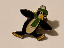 1 Pin Pinguin auf Schlittschuhen