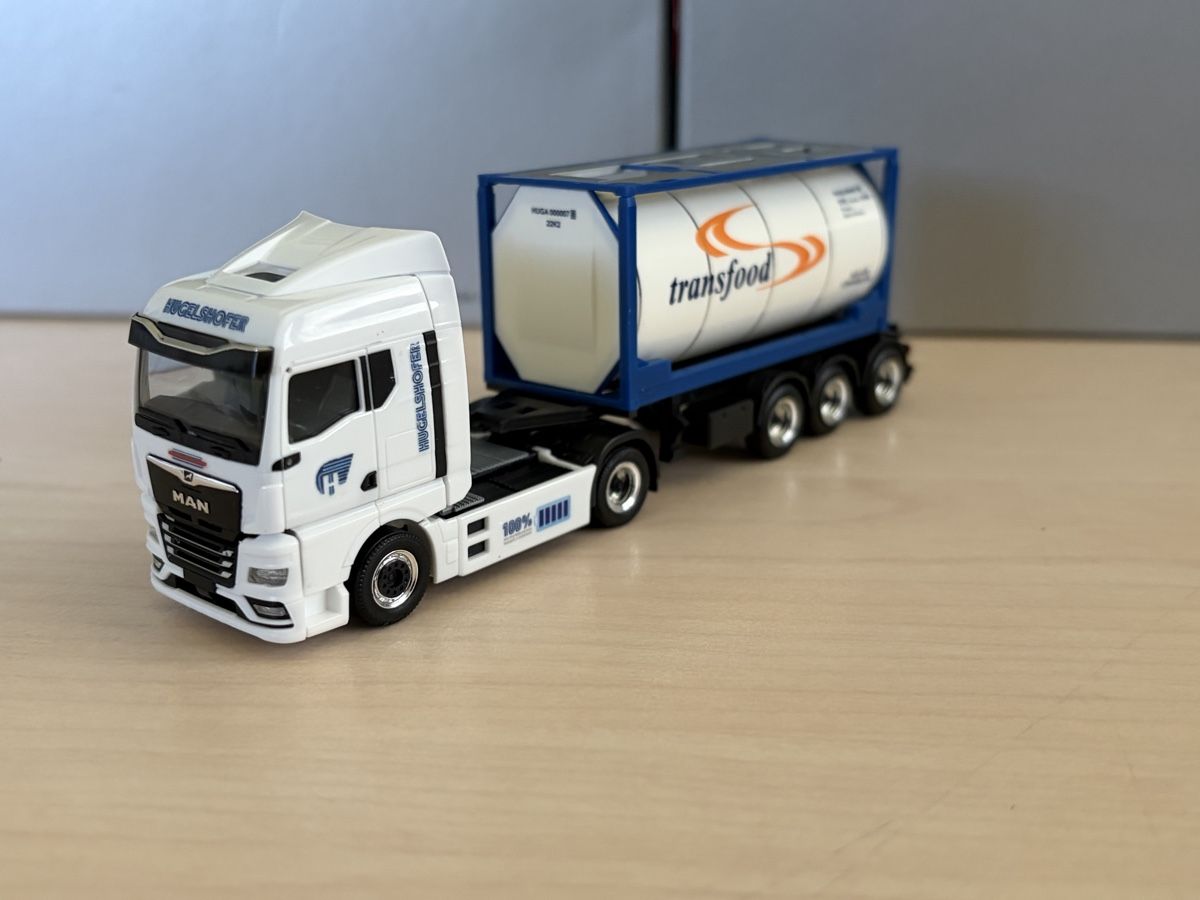 Herpa Voitures modèles: MAN eTGX Hugelshofer Tankcontainer – Neuf avec emballage d'origine à Felben-Wellhausen par Mobil01