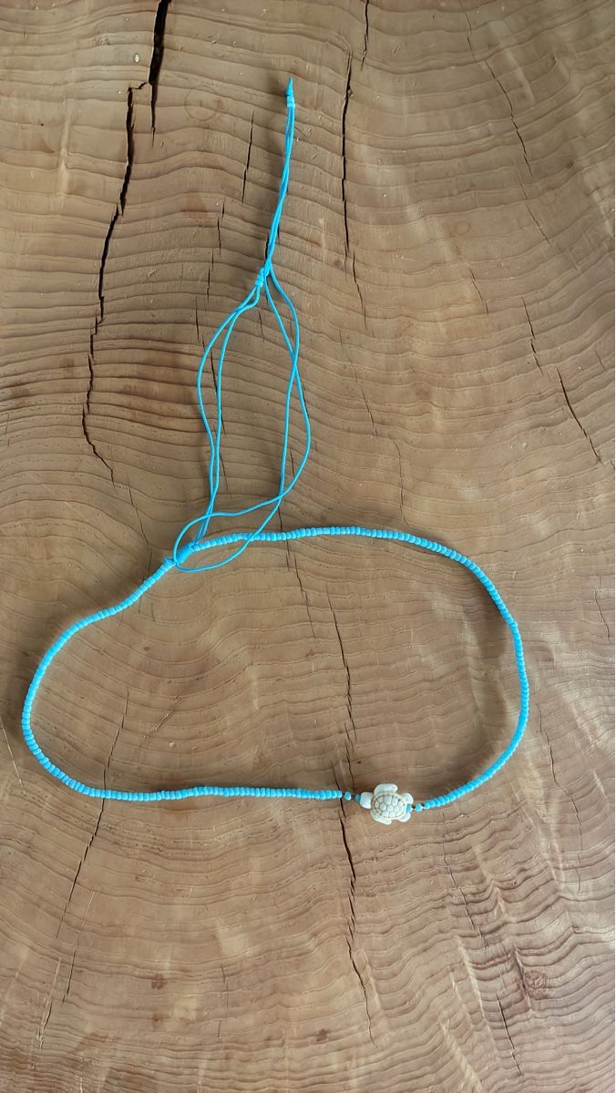 Catenine: Beaded necklace light blue with turtle charm used – Nuovo e nell'imballaggio originale da Zürich venduto da and_bbr2