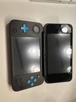 New Nintendo 2DS XL Konsole mit Spielen und Zubehör