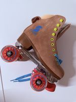 Rollschuhe altrosa mit Glitzerrollen 