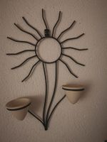 Déco murale soleil en métal avec pots, vintage chic!