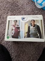 Ergo Baby Trage mit Newborn Einsatz und Regenschutz