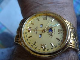 ASTRON MOND FACE GRÖSE HEREN UHR.QUARTZDAT.TAG LÄÜFT-44X45MM