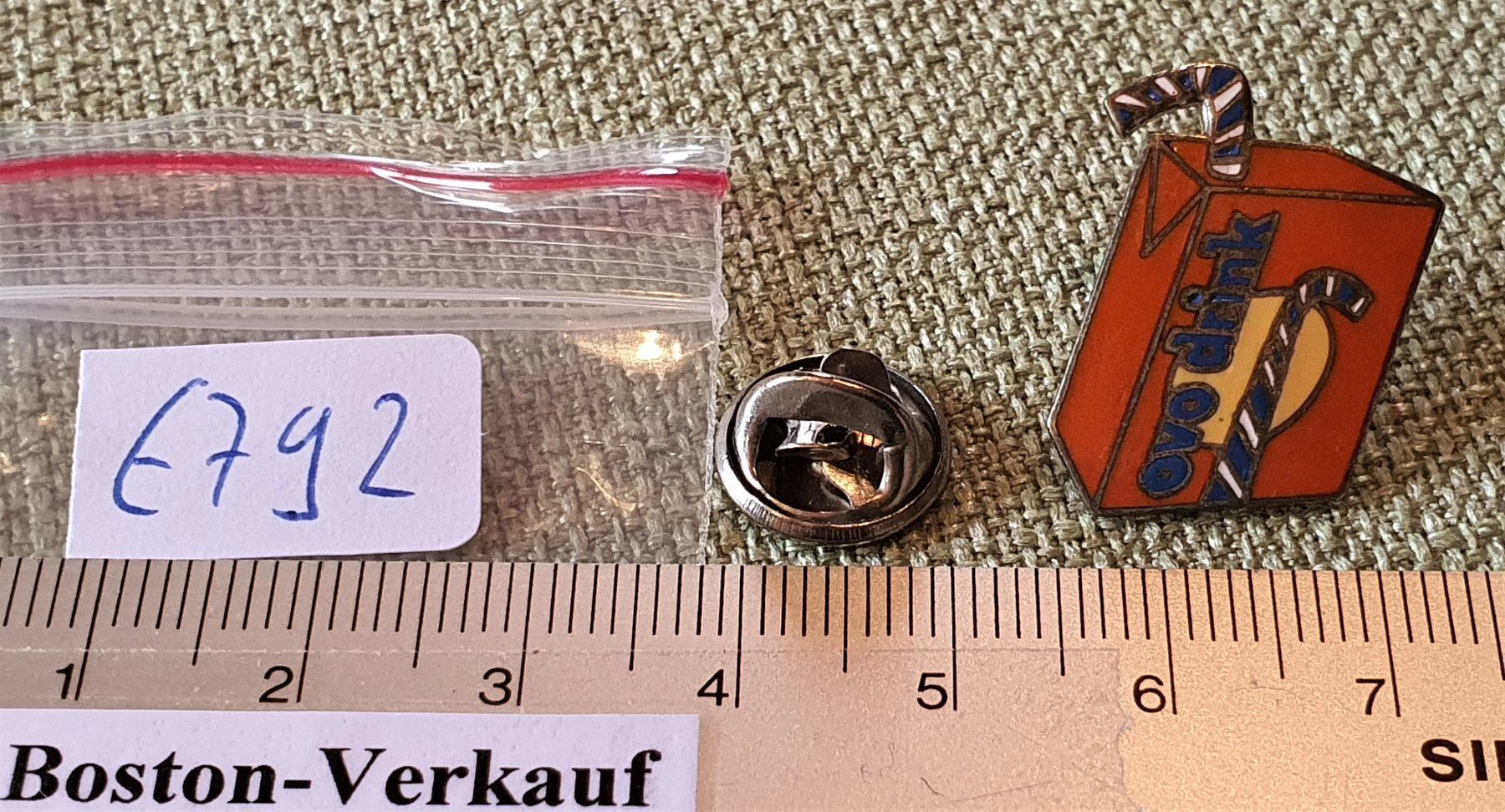 Placchette & Badge: E792 - Pin Mondo - OVO Drink – Usato da Reinach BL venduto da Boston-Verkauf 2