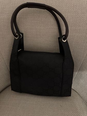 Gucci Black Handbag like new condition make me an offer