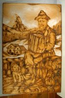 Grosses Brandbild Mann mit Handorgel sign. 60 x 91 cm