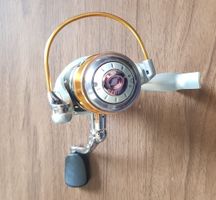 Pezon Michel  FR30 – front drag, quick‑release spool button