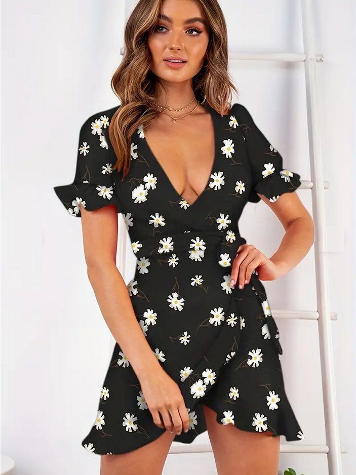 Vestiti: Schwarzes Wickelkleid Gr. M mit Blumenmuster – Nuovo e nell'imballaggio originale da Fully venduto da VaneaSelection 1