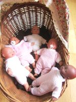 Puppenwagen mit 5 Puppen