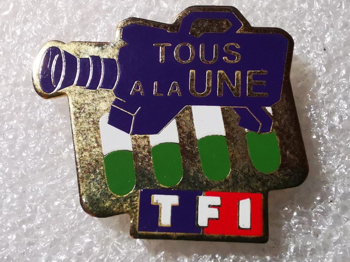 Placchette & Badge: Ansteckpin 11: TF1 – Usato da Oppligen venduto da Pin-Fall-Shop