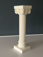 Statue de colonne grecque en pierre blanche