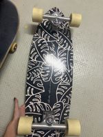 Skateboard with leaf pattern, pre-owned