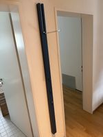 Wall-mounted coat rack, dark blue, extendable arm