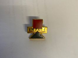 Pin's Impact vintage - Élégance et distinction!