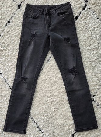 Schwarze, zerrissene Damenjeans