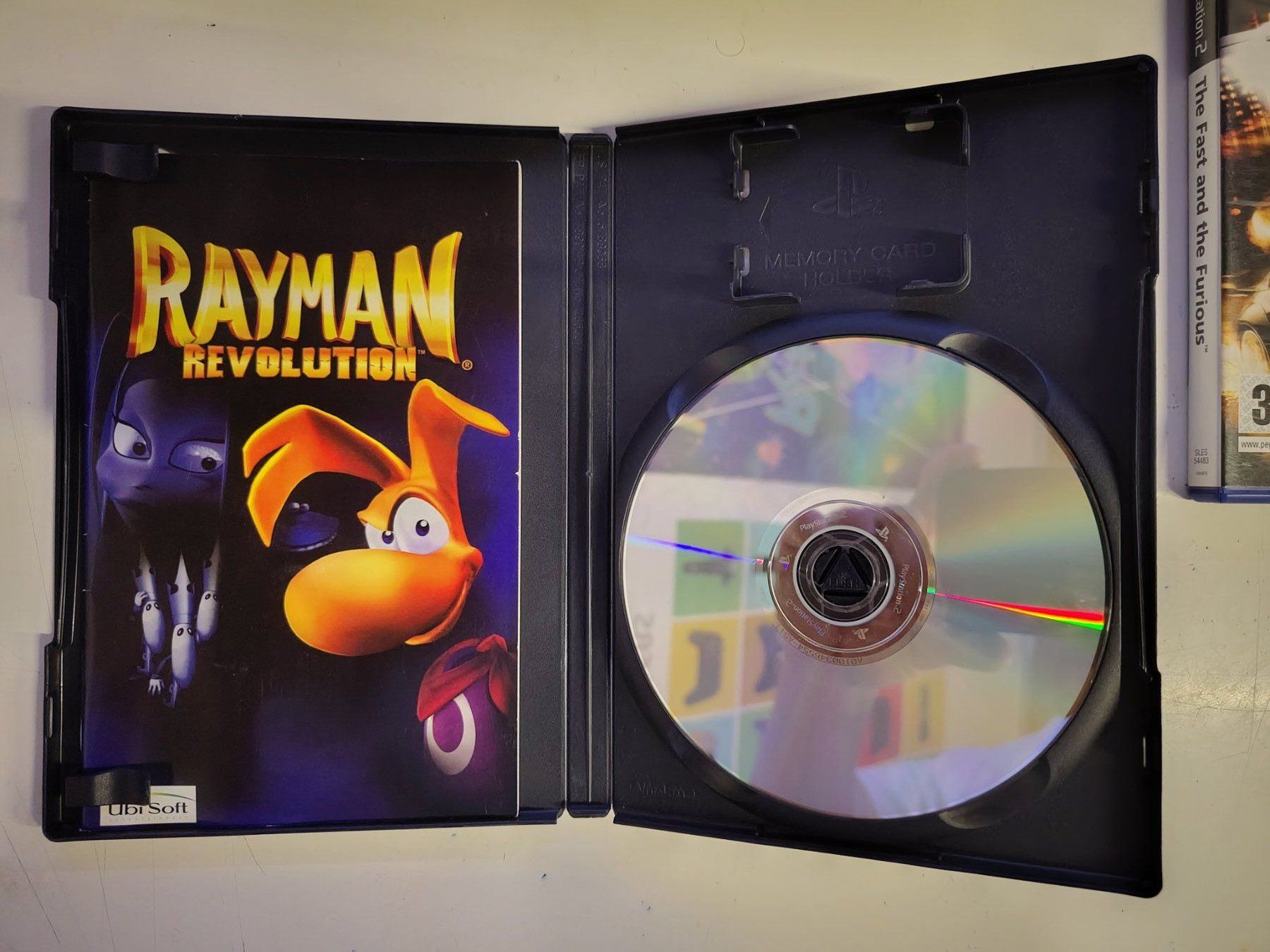 Sony Spiele: Jeu PS2 - Rayman Revolution – Gebraucht aus Saxon von dan_drn5 3