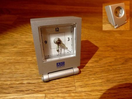 Designe Wecker Stahl klein AIG Europe