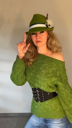 Pull en tricot vert sapin