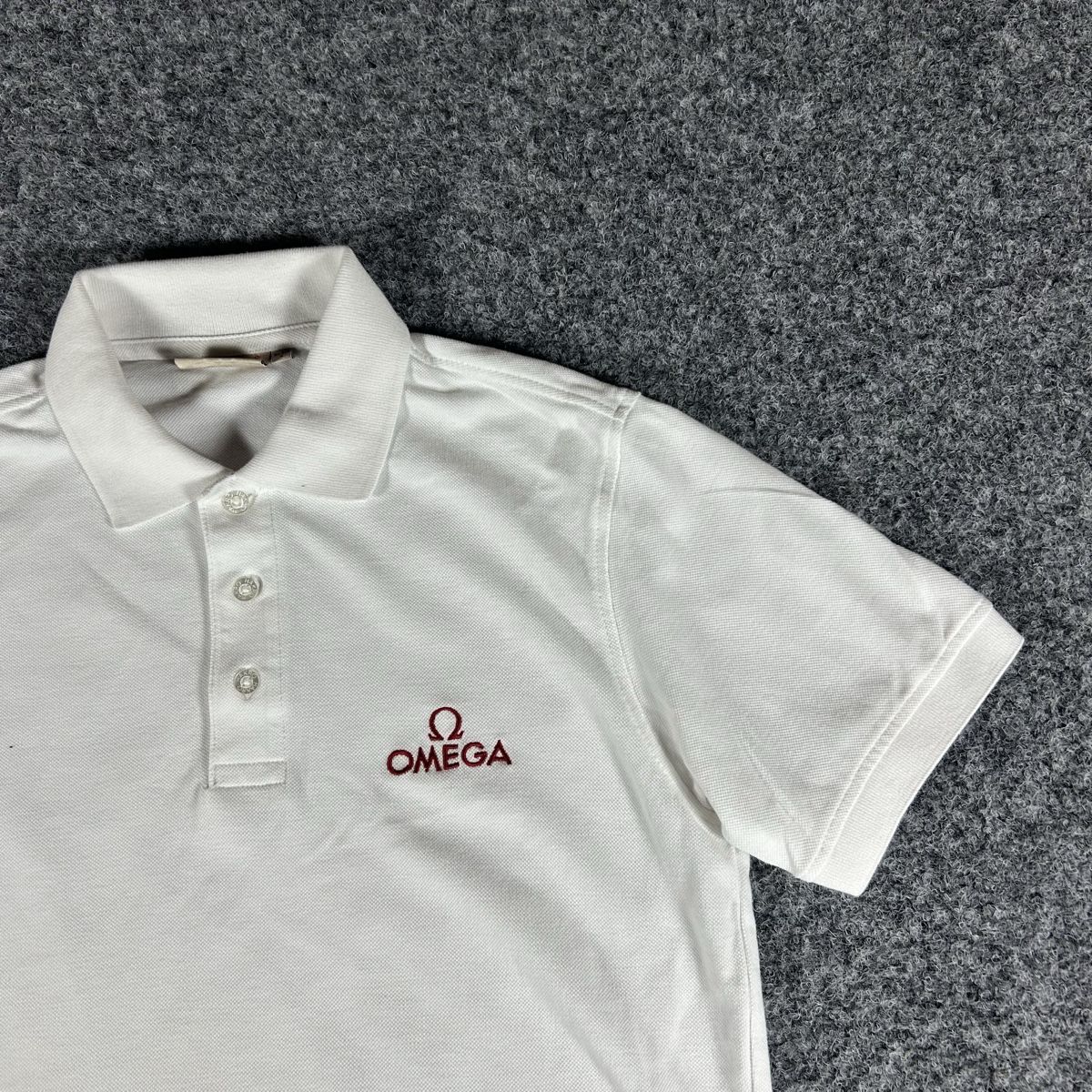 Magliette Polo: Oméga polo – Usato da La Sagne NE venduto da Matlasape 1