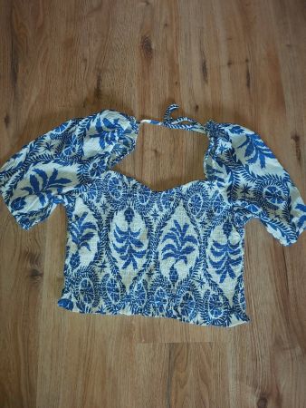Top à manches bouffantes taille L