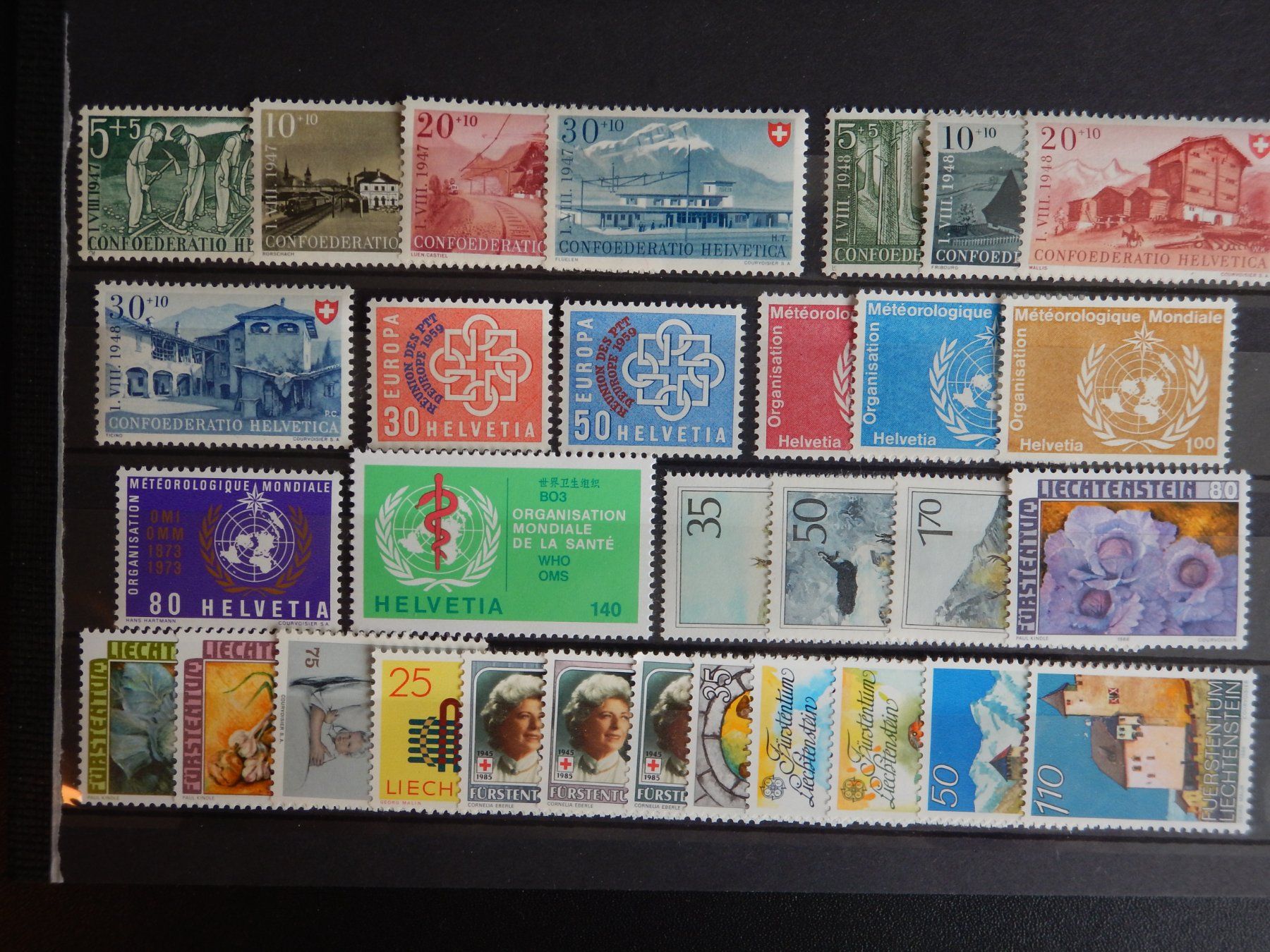 Alle Briefmarken: Alpenländer Lot mit Postfrischen Werten – Gebraucht aus Zürich von Muehlekauf