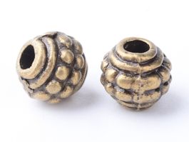 Tibetische Perlen antik Bronze 7mm, 2 Stück
