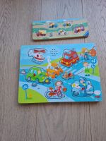 Puzzle Set mit Fahrzeugmotiven. Eines mit Geräuschen