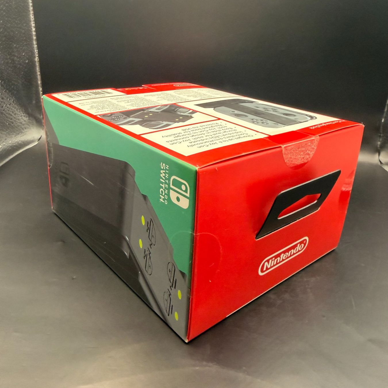 Nintendo Adattatori & Cavi: Nintendo Switch Ladestation für Joy-Con – Nuovo e nell'imballaggio originale da Düdingen venduto da Nerdworld 3