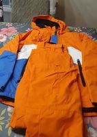 Combinaison de ski orange et bleu, taille enfant