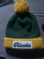 Berretto Ricola verde/giallo con pompon nuovo