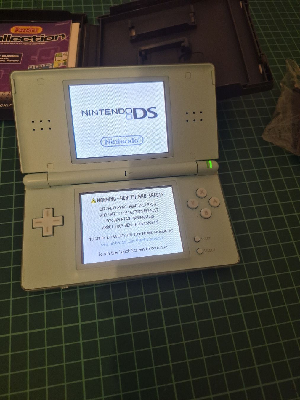 Nintendo Konsolen: Nintendo DS Lite - Ice Blue - With Puzzler Collection – Gebraucht aus Meyrin von Retro-GZ 2