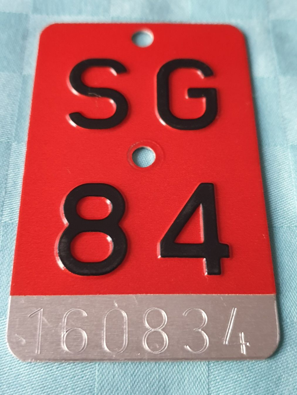 Insegne: Velonummer SG 84 – Usato da Mörschwil venduto da spirspi