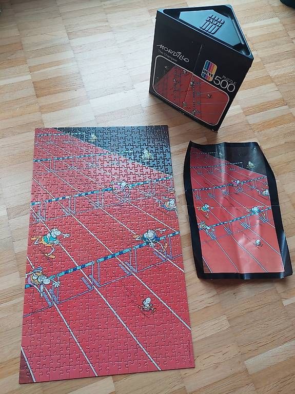 Heye Puzzle: Mordillo Puzzle "The Champion" – Usato da Embrach venduto da pz78