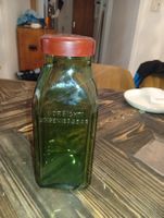 Alte grüne Apothekerflasche Vorsicht Ungeniessbar.