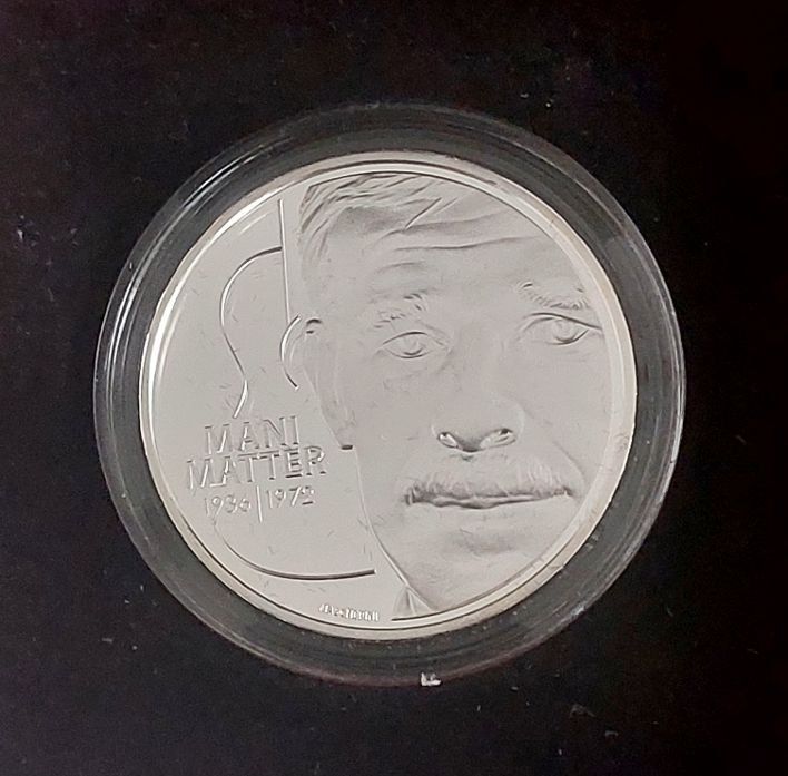 Tutti le monete: 20 Franken 2022 Silber pp Mani Matter Box – Nuovo (secondo la descrizione) da Arch venduto da moneyswiss 1