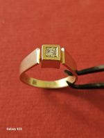 Gelbgoldring 750, mit 1 natürlichen Brillanten von ca.0.10ct