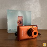 Canon IXUS 130 Digitalkamera Orange mit OVP