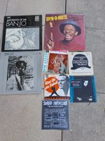 Lot de vinyles variés : Jazz, variétés, et plus encore !