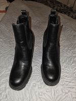 Bottines noires élégantes à talons hauts