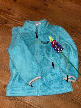 Türkisfarbene Fleecejacke Jack Wolfskin 110/116