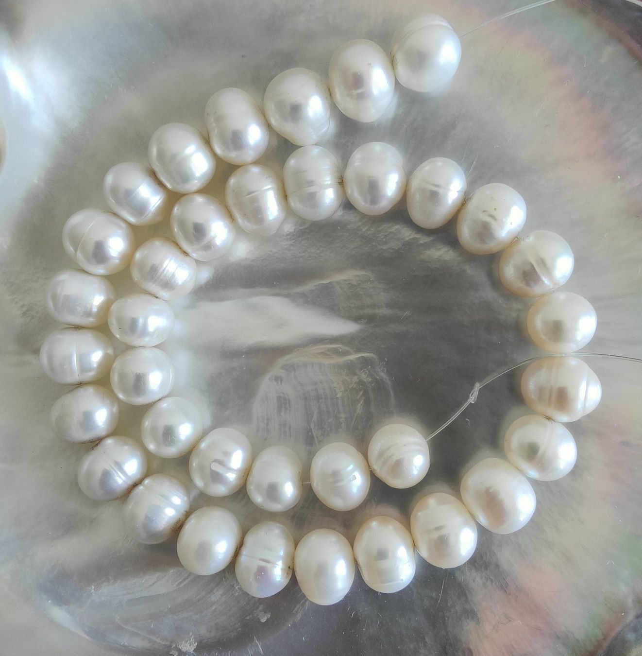 Perle (finte): Süsswasserperle, oval ca. 9x10mm, weiss – Nuovo e nell'imballaggio originale da Rümlang venduto da 21f