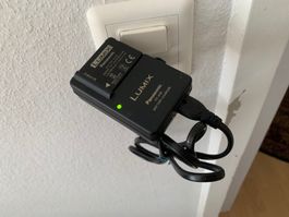 Panasonic Lumix Akku Ladegerät DE-A66 mit 2 Akkus