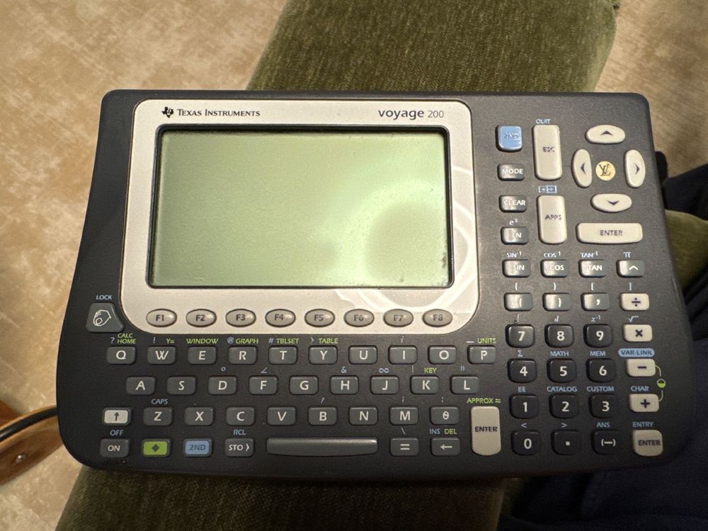 Texas Instruments VOYAGE 200 - Calculatrice Graphique à Restaurer