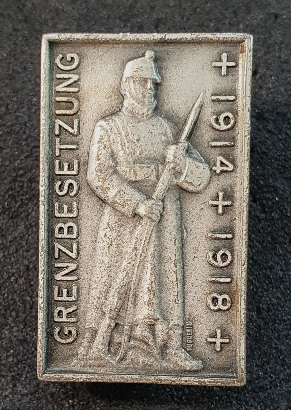 Schweizer Armee Placchette & Badge: GG069 - Brosche Grenzbesetzung 1914 - 1918 – Usato da Reinach BL venduto da Boston-Verkauf