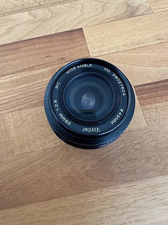 Vivitar Obiettivi: Vivitar 28mm 1:2,8 Weitwinkel-Objektiv manuell – Usato da Zürich venduto da domeldidom