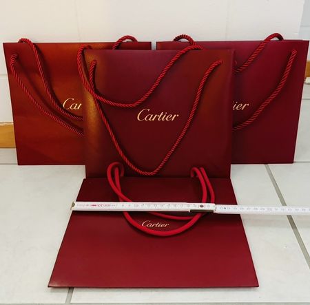 4 Cartier Taschen Papier