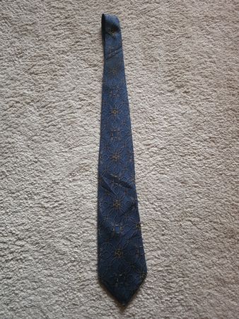 Cravate Hermès motif cordes bleu 100% soie 