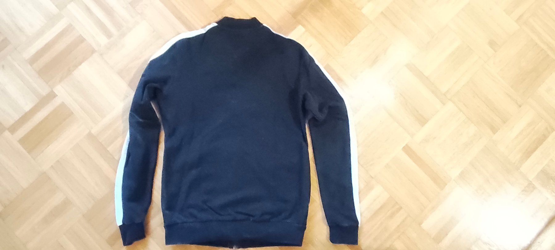 Puma Giacche & Cappotti: Trainerjacke Puma - 128, schwarz/grau – Usato da Oeschgen venduto da Minty 1